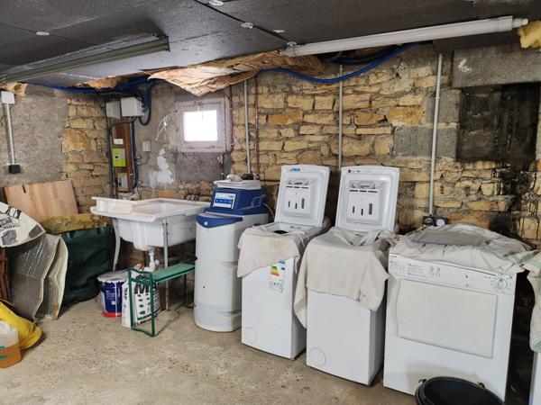 Maison de ville avec hangar et joli jardin