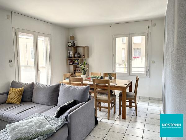 Centre de Feurs appartement 2 pièce(s) 52,2 m2 avec terrasse, place de parking privée et Cave.