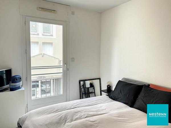 Centre de Feurs appartement 2 pièce(s) 52,2 m2 avec terrasse, place de parking privée et Cave.