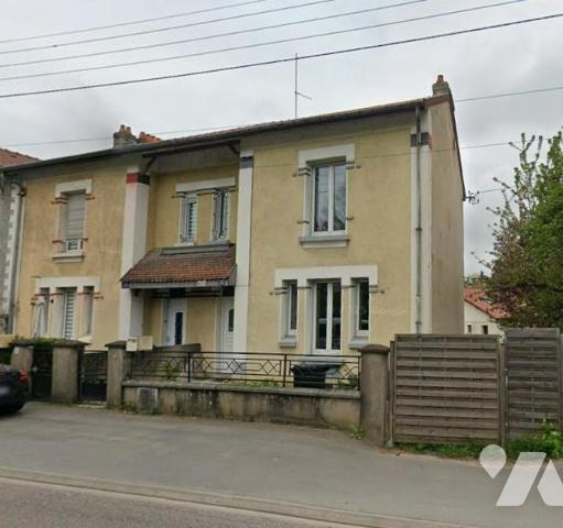 Maison d'habitation mitoyenne sur un côté