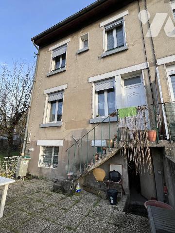 Maison d'habitation mitoyenne sur un côté