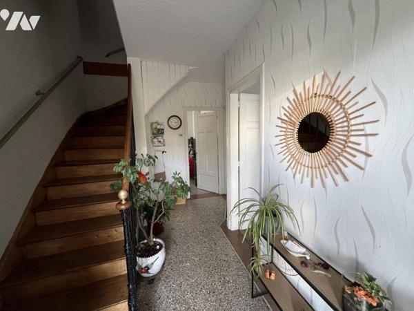 Maison d'habitation mitoyenne sur un côté