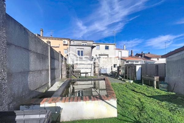 Maison de bourg 88m² - 3 chambres - jardin - terrasse