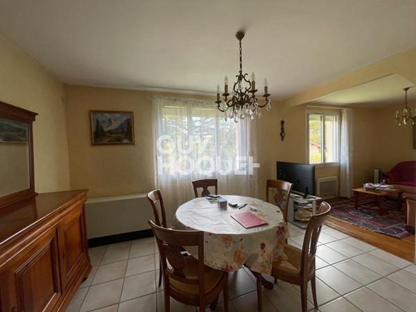 Maison familiale avec grand terrain et garage