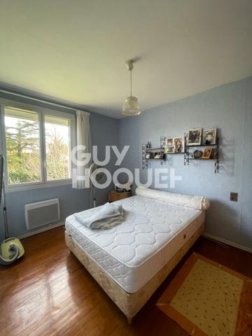 Maison familiale avec grand terrain et garage