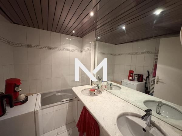 Les Buclos - T4 transformé en T3 - jardin et stationnement | Premium Immobilier