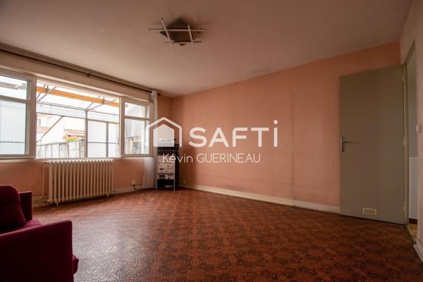 Maison T4 avec garage et jardin à renover à Bruges