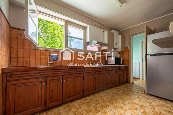 Maison T4 avec garage et jardin à renover à Bruges