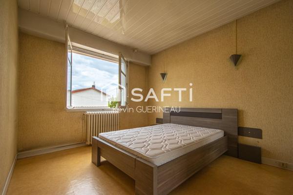 Maison T4 avec garage et jardin à renover à Bruges