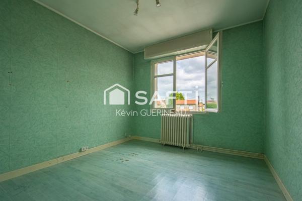 Maison T4 avec garage et jardin à renover à Bruges