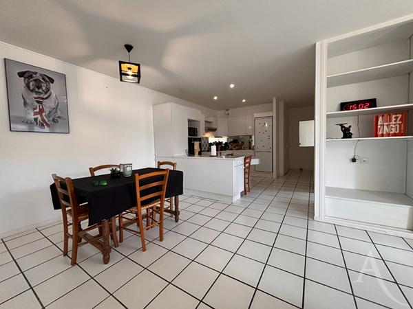 Appartement 3 pièces avec deux garages et cave !