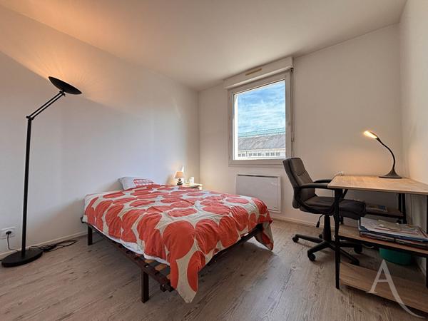 Appartement 3 pièces avec deux garages et cave !