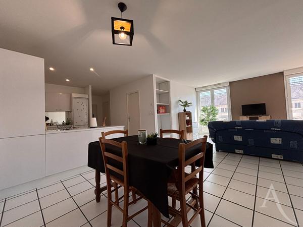 Appartement 3 pièces avec deux garages et cave !