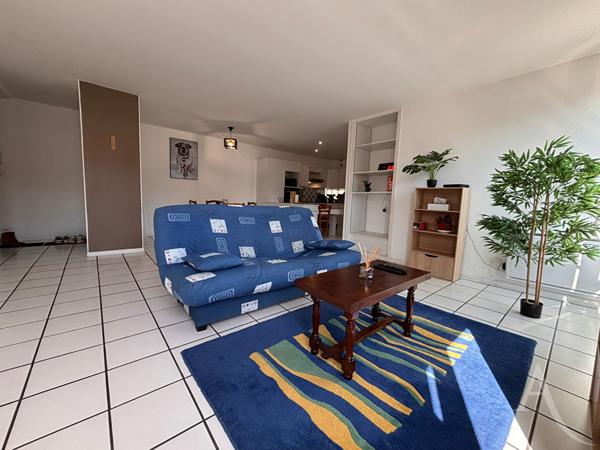 Appartement 3 pièces avec deux garages et cave !