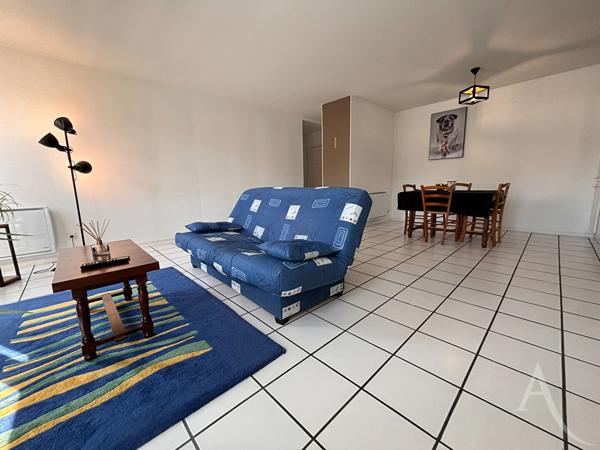 Appartement 3 pièces avec deux garages et cave !