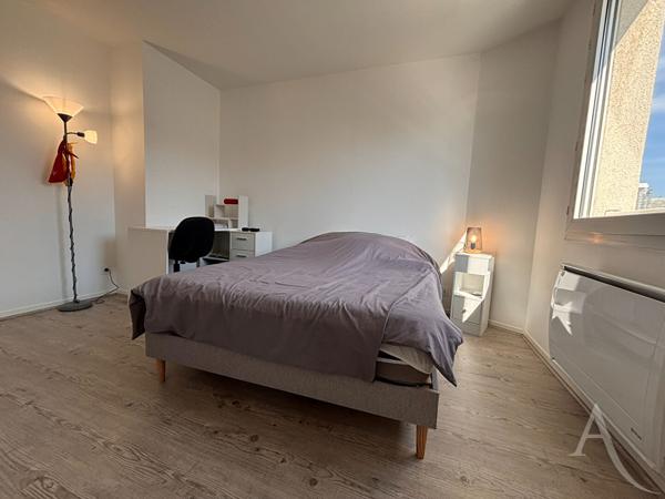 Appartement 3 pièces avec deux garages et cave !