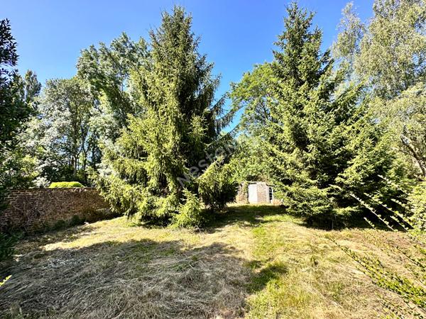 Charmante maison en pierre de Loire d'environ 112.19 m² comprenant 4 chambres à vendre dans le centre ville de La Chartre-sur-le-Loir (72340)