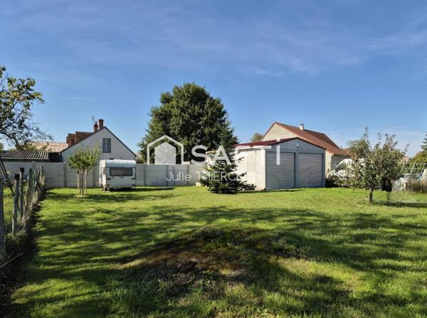 Terrain à bâtir, clôturé avec bâtiment préfabrique