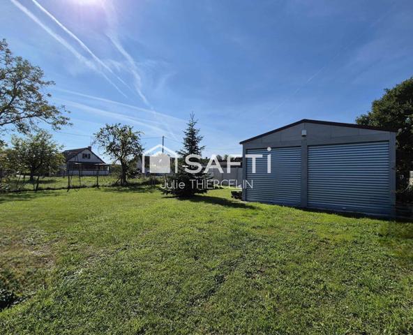 Terrain à bâtir, clôturé avec bâtiment préfabrique