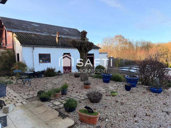 Belle maison coup de cœur avec un parc exceptionnel