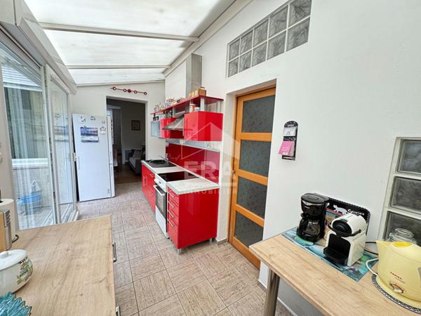 À vendre appartement de charme en rez-de-chaussée avec terrasse