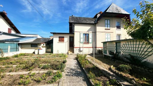 70m² - 3ch -Jardin 214m² - garage double - Cave 24m²