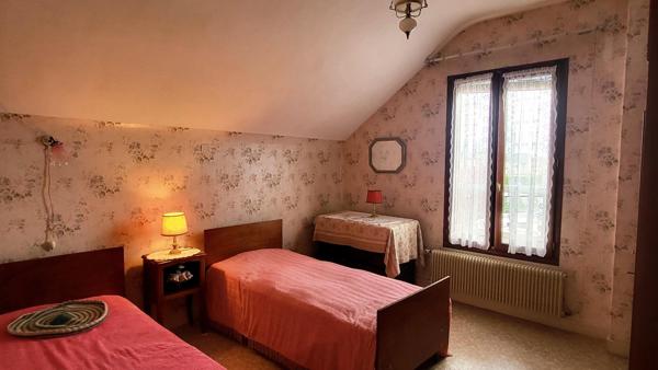 70m² - 3ch -Jardin 214m² - garage double - Cave 24m²