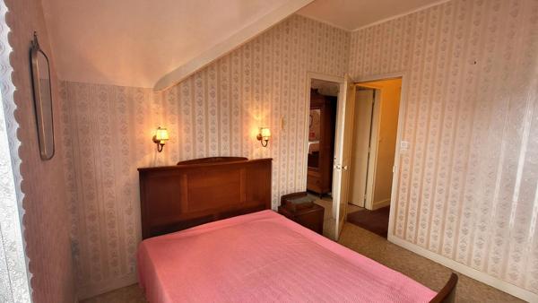 70m² - 3ch -Jardin 214m² - garage double - Cave 24m²