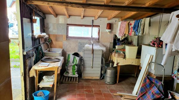 70m² - 3ch -Jardin 214m² - garage double - Cave 24m²