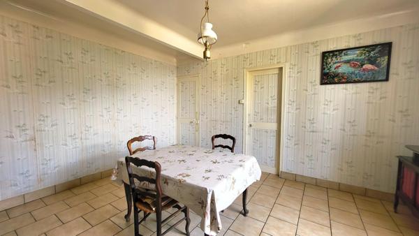 70m² - 3ch -Jardin 214m² - garage double - Cave 24m²