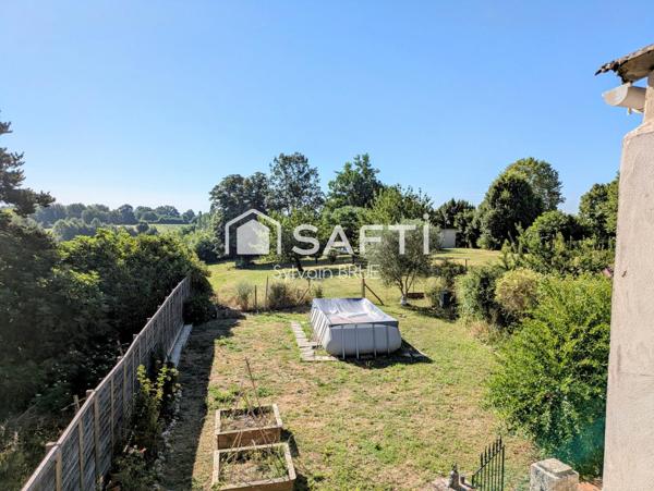 Maison de caractère en pierre avec terrasse et jardin