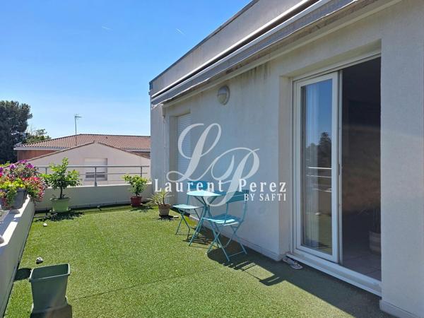 Appartement T4 traversant avec terrasse de 28 m² et parking