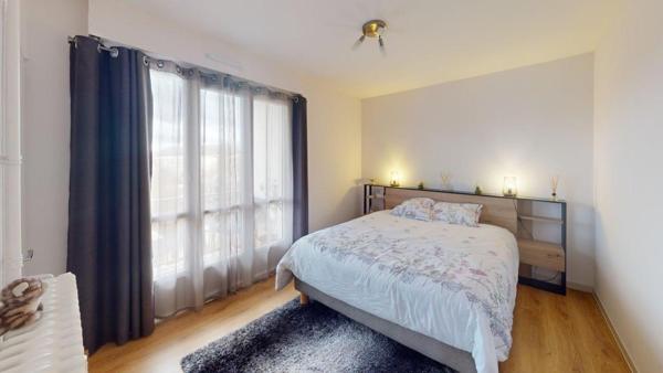 Grand T4 lumineux 96 m² avec balcon et ascenseur