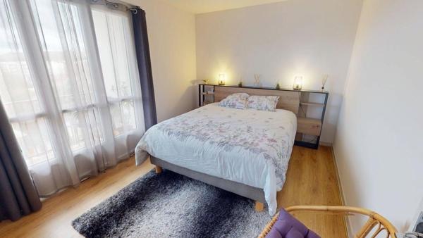 Grand T4 lumineux 96 m² avec balcon et ascenseur