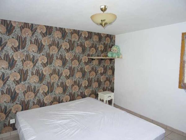 NEUVIC ENTIER A 20 MINUTES EST DE LIMOGES MAISON SUR SOUS SOL SEMI ENTERRE 4 CHAMBRES SUR UN TERRAIN DE 6400 M²