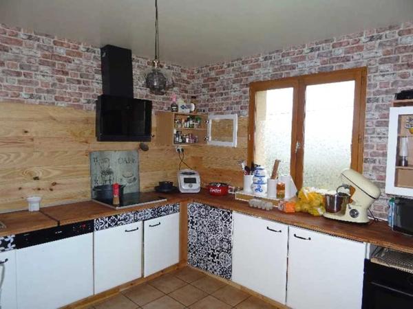 NEUVIC ENTIER A 20 MINUTES EST DE LIMOGES MAISON SUR SOUS SOL SEMI ENTERRE 4 CHAMBRES SUR UN TERRAIN DE 6400 M²