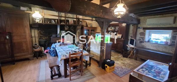 Maison en pierre et poutres apparentes, à rénover