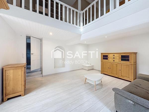 Maison de caractère en cœur de ville avec jardin intimiste et fort potentiel.