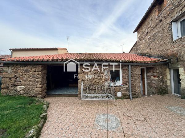 Maison de caractère en cœur de ville avec jardin intimiste et fort potentiel.