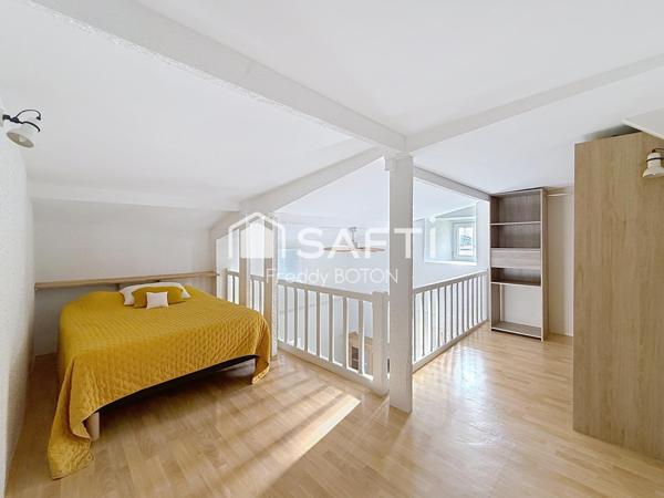 Maison de caractère en cœur de ville avec jardin intimiste et fort potentiel.