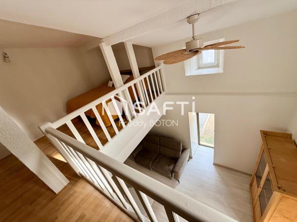 Maison de caractère en cœur de ville avec jardin intimiste et fort potentiel.