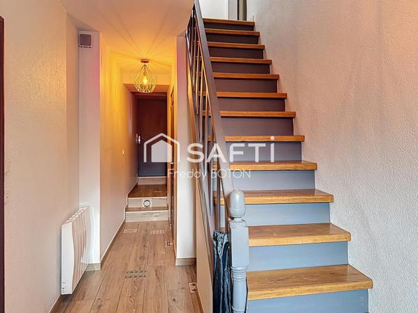 Maison de caractère en cœur de ville avec jardin intimiste et fort potentiel.