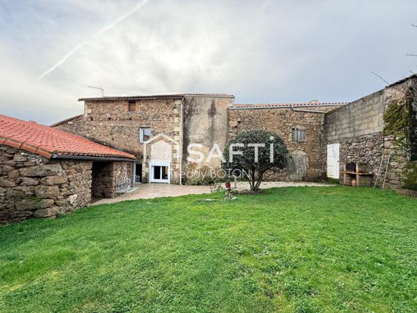 Maison de caractère en cœur de ville avec jardin intimiste et fort potentiel.