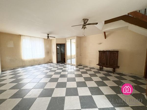 Maison de ville en semi plain pied