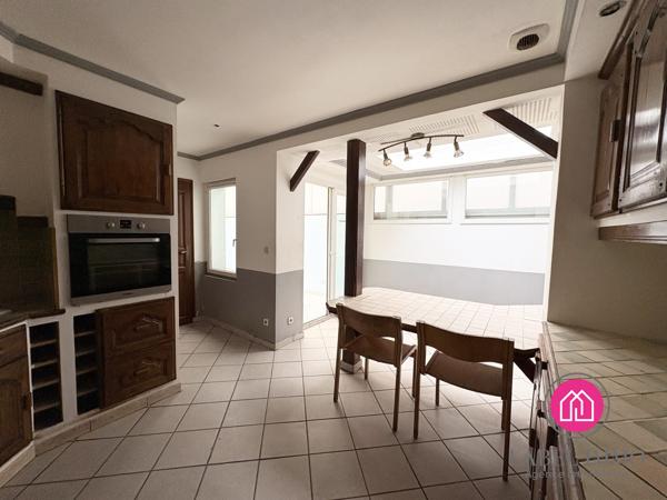 Maison de ville en semi plain pied