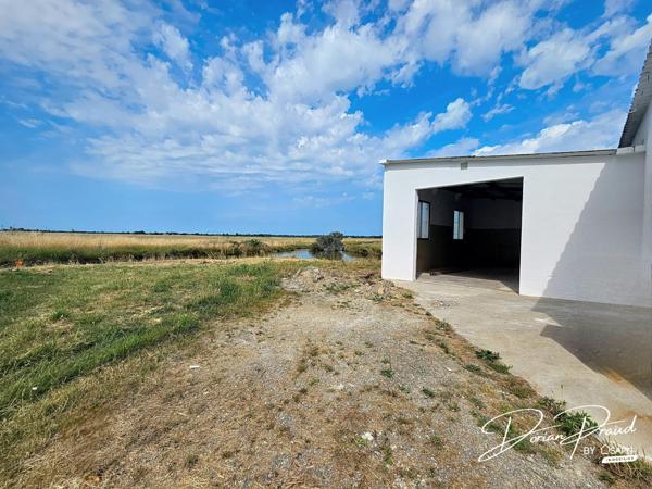Garage 40 m² avec électricité et terrain