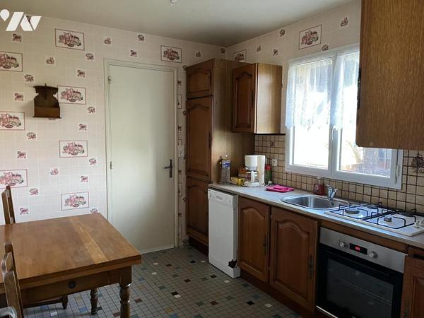 Houlgate, sur 520m² de jardin, maison de plain-pied avec combles aménageables.