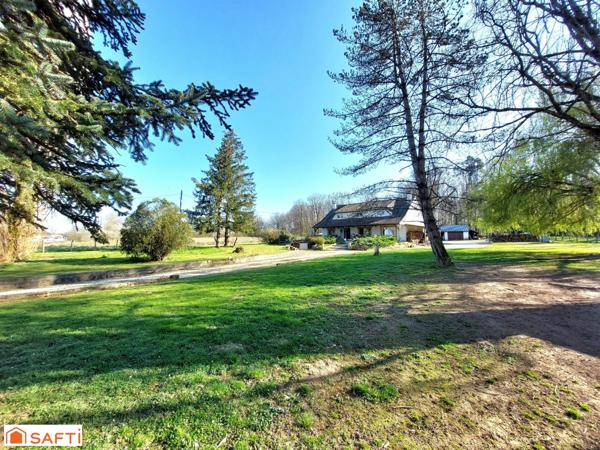 Maison isolée avec 5 chambres et grand terrain.
