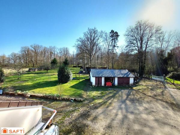 Maison isolée avec 5 chambres et grand terrain.