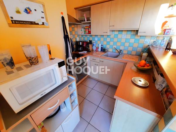 APPARTEMENT DE TYPE 3 AVEC ASCENSEUR TERRASSE ET GARAGE